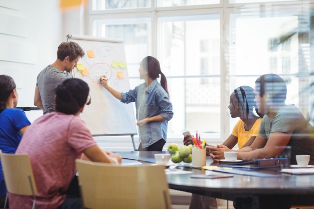 business executives discussing with their colleagues